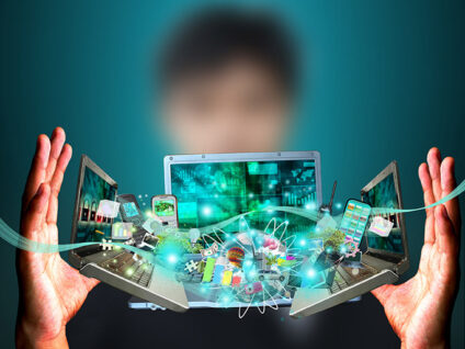 illustration with two hands framing three laptops, phones, software symbols
