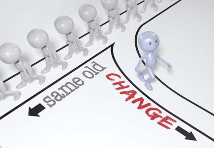 One person makes a change to a new different direction from crowd of people