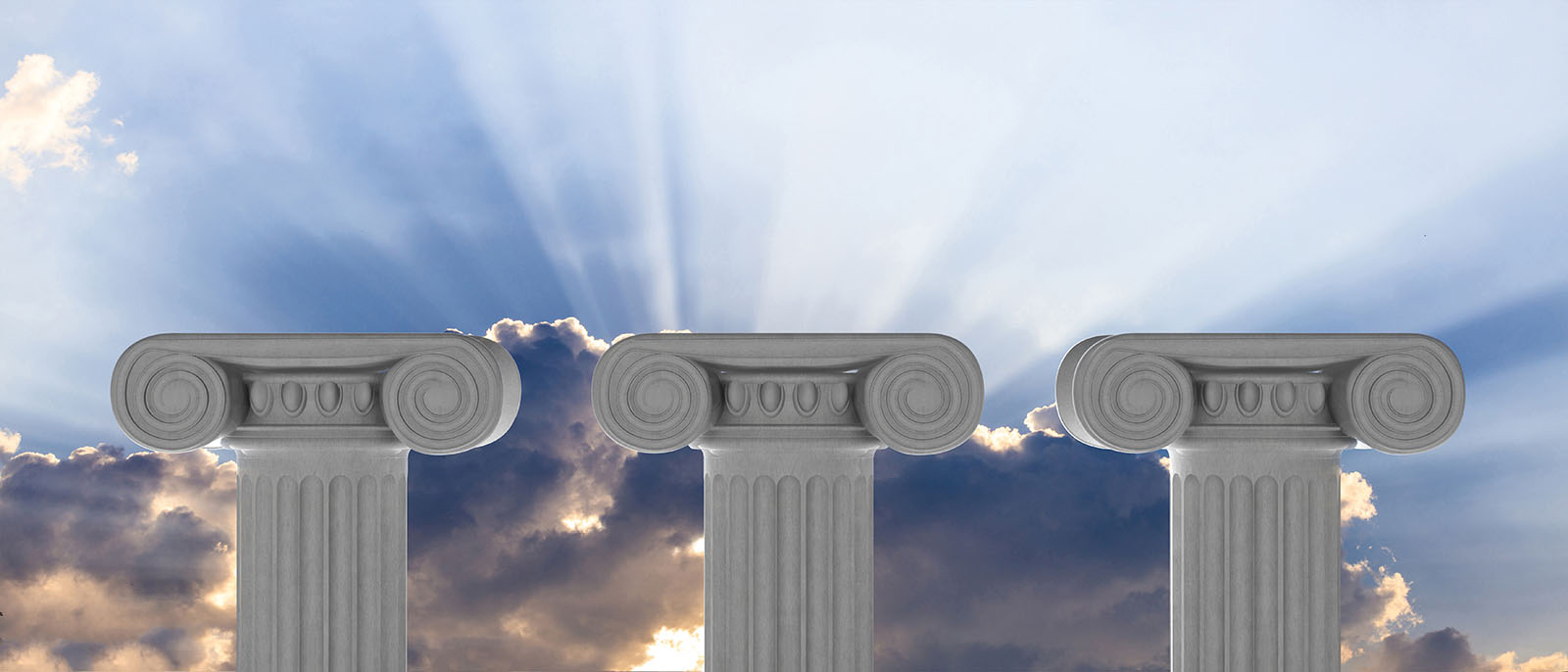 three marble Ionic pillars