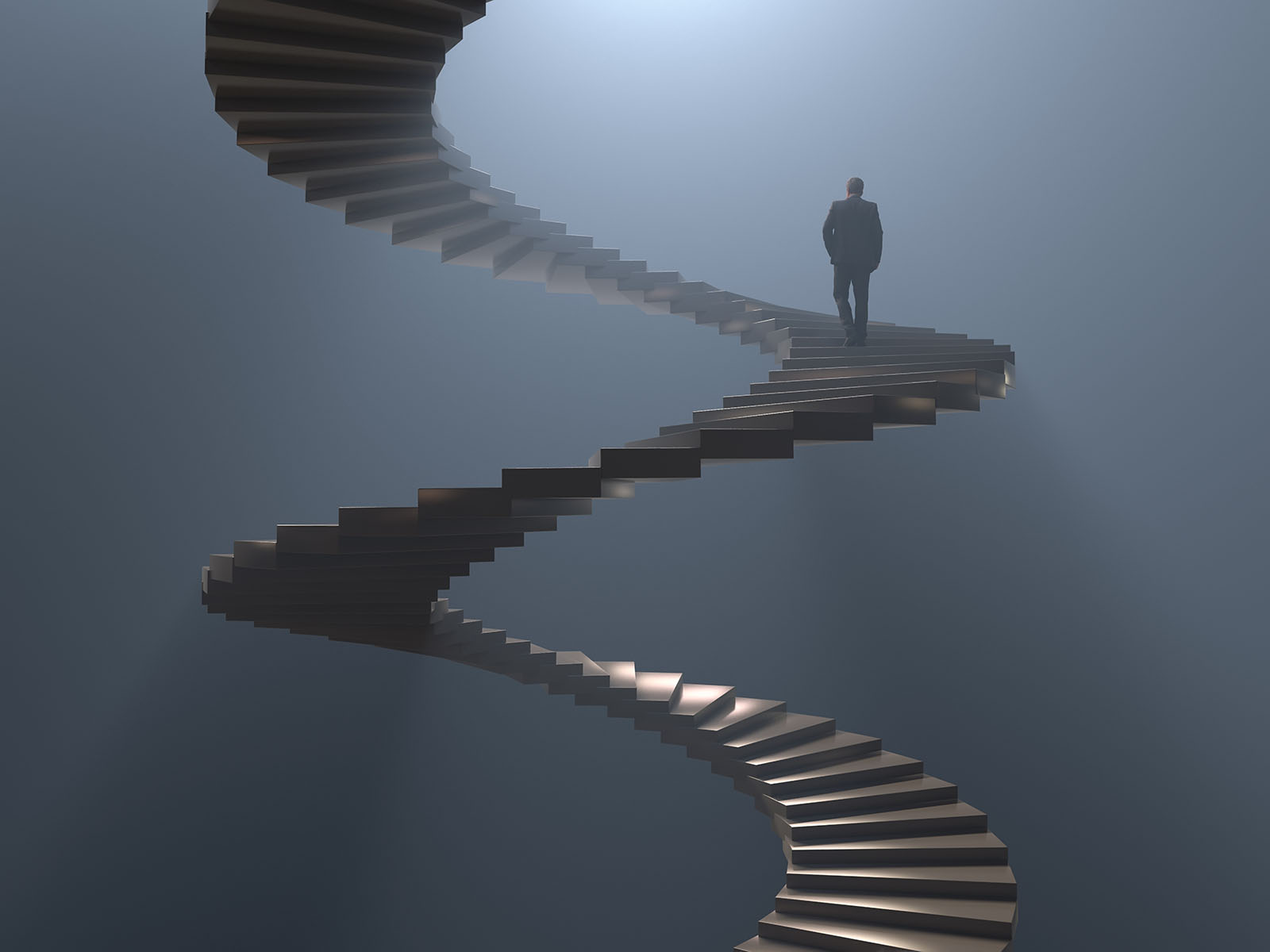 man on spiral staircase
