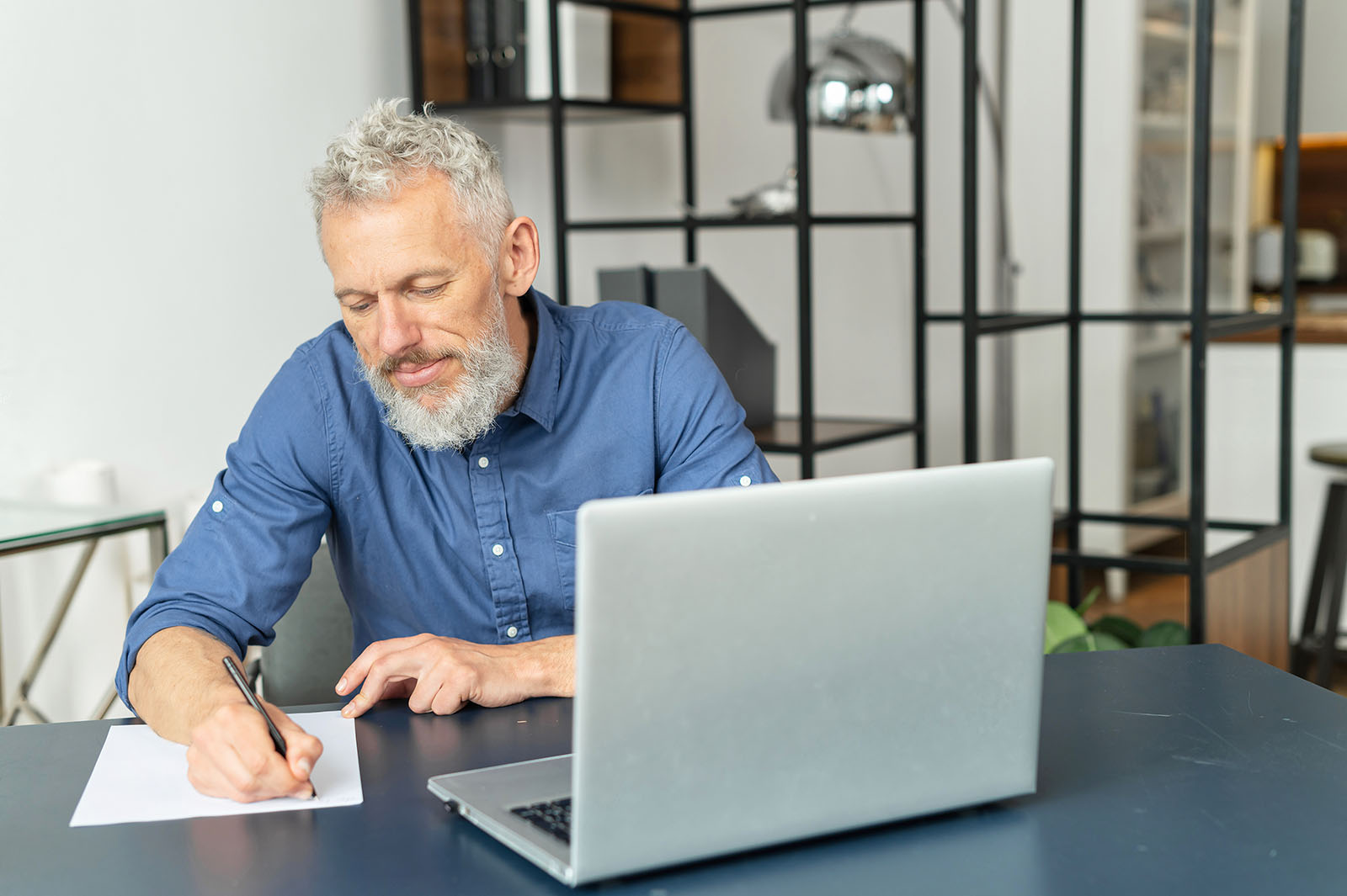 senior man working at desk