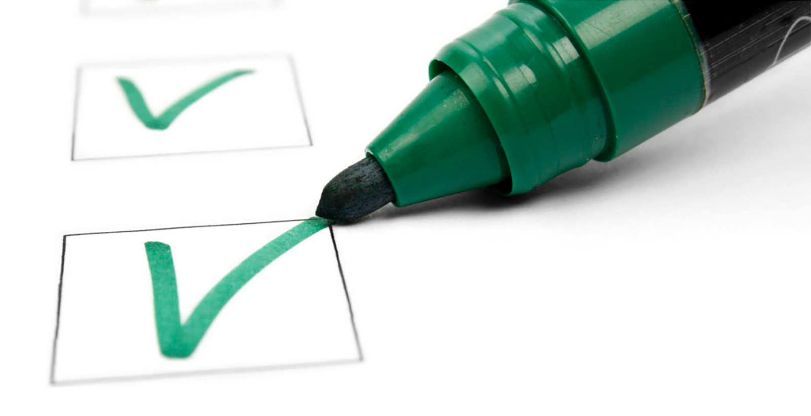 green marker checking boxes