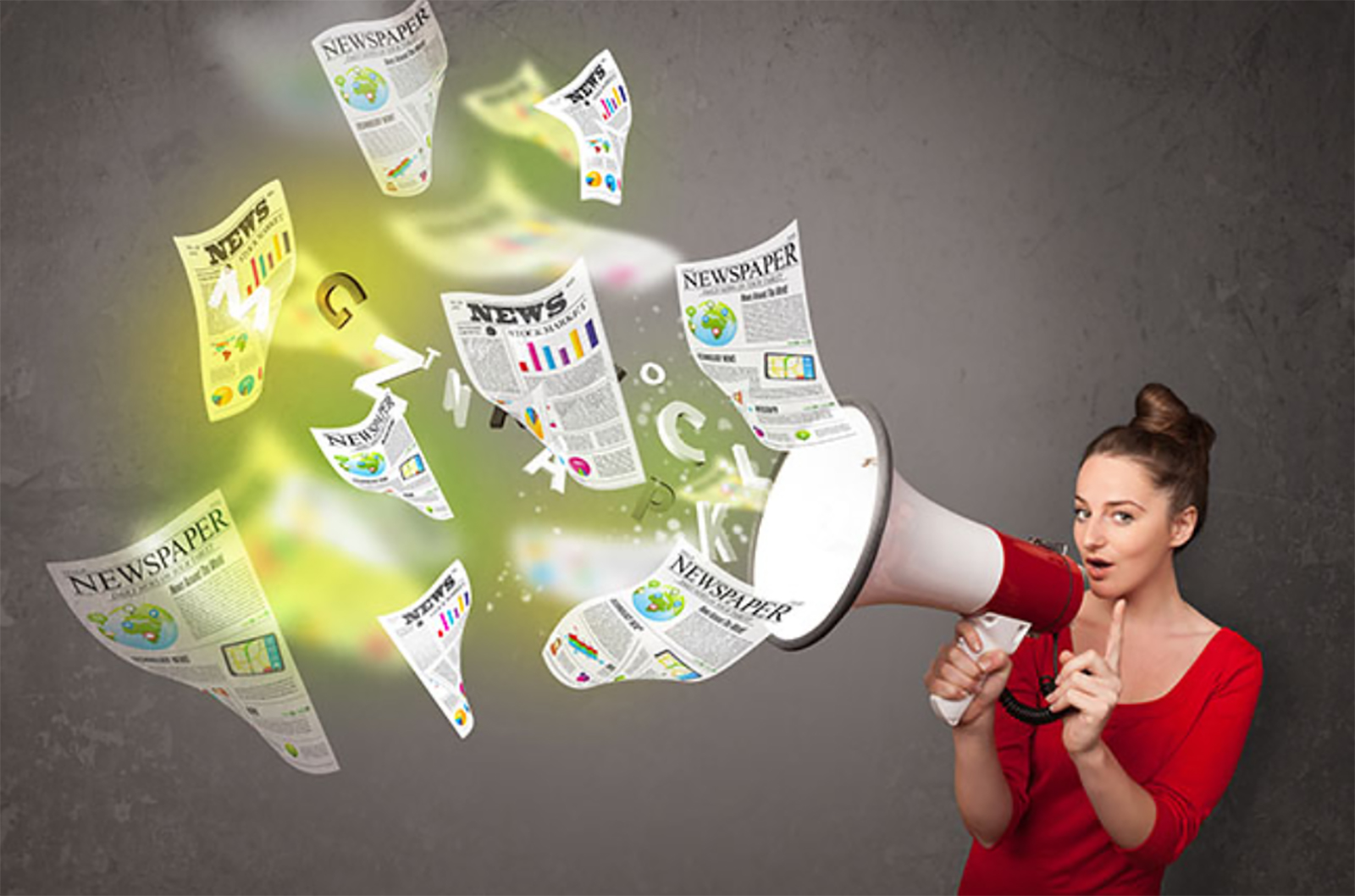 Woman yelling into bullhorn and newspapers flying out