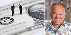 250_Grunden_BusinessmenStandingOnDollarB