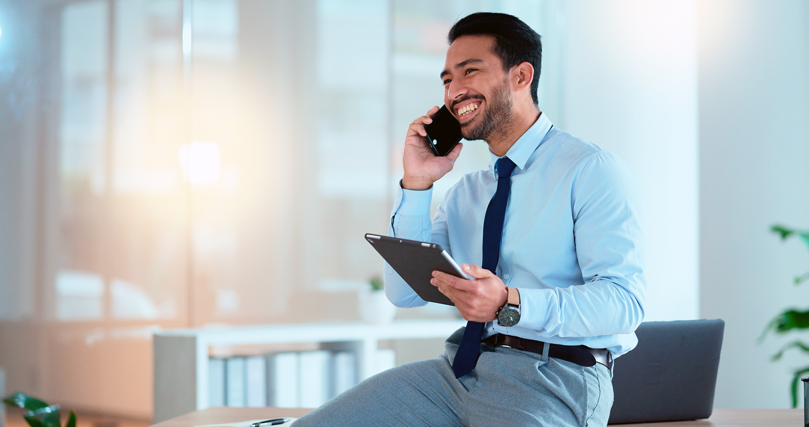 smiling businessman on phone